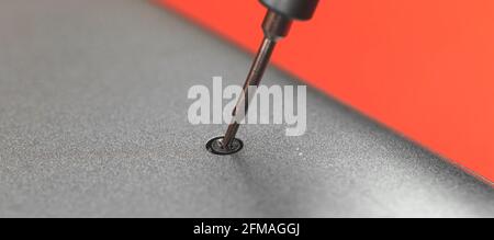 Laptop repair and maintenance concept, screwdriver fix the equipment banner Stock Photo