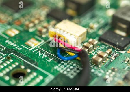 Dirty and dusty microcircuit inside the laptop, reason for poor performance Stock Photo