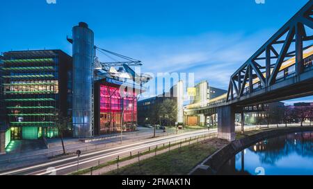 Light trails of the subway and road traffic at Gleisdreieck in Berlin. Stock Photo