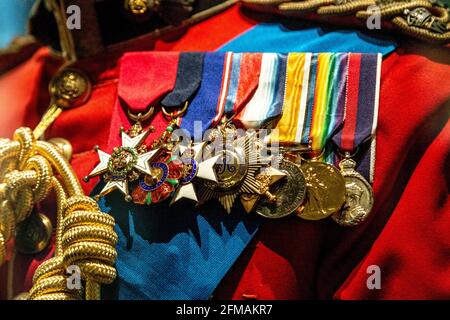 Medals and sash detail on the dress uniform of King George V, The Fusiliers Museum, Tower of London, London, UK Stock Photo