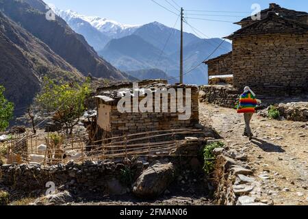 Young woman in village on the road to Jomsom, Mustang, Nepal Stock Photo