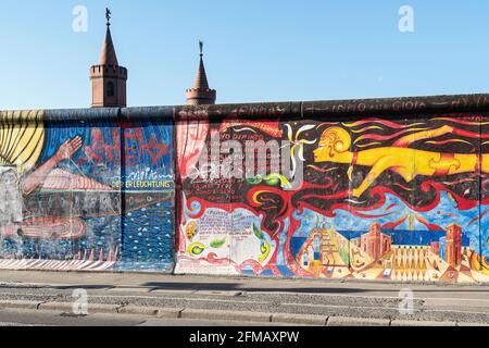 Berlin, East-Side-Gallery on the former Berlin Wall, longest open-air gallery in the world, towers of the Oberbaum Bridge Stock Photo