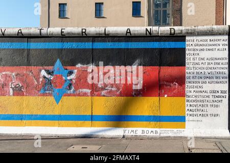 Berlin, East Side Gallery on the former Berlin Wall, art project by artists from all over the world, peace flag, G. Schäfer Stock Photo