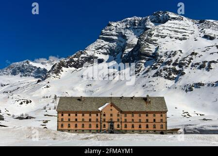 Simplon Hospice on the Simplon Pass in winter, Valais, Switzerland Stock Photo