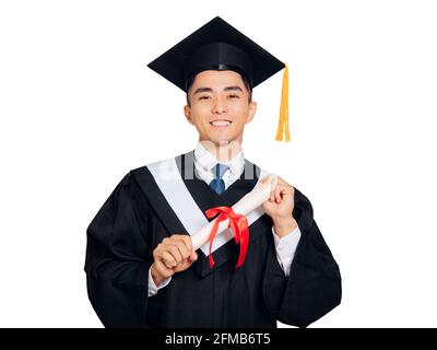 Young Male graduate holding  diploma isolated on white background Stock Photo