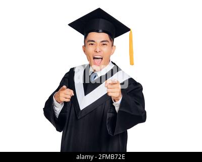 Young man with graduation cap and gown and diploma Stock Photo - Alamy