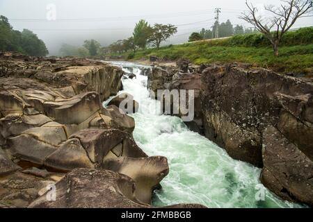 Geibikei is a ravine in the Satetsu River in Ichinoseki City, Iwate Prefecture, Japan, in a misty morning refreshes the atmosphere. This is a popular Stock Photo