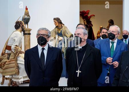 Malaga, Spain. 07th May, 2021. President of Fundacion Unicaja, Braulio Medel; Malaga Bishop, Jesus Catala Ibañez; and President of Unicaja, Manuel Azuaga seen during the exhibition at Centro Cultural Fundacion Unicaja.'Un siglo de esplendor' is an exhibition that shows the artistic heritage of the Holy Week brotherhoods of Malaga and is one of the events organized by Agrupacion de Cofradias de Semana Santa de Malaga for the centenary of the institution. Credit: SOPA Images Limited/Alamy Live News Stock Photo