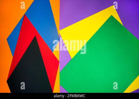 Abstract background from different sheets of colored paper Stock Photo