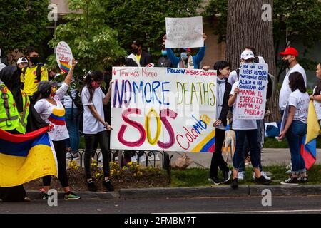 Washington DC, USA. 07th May, 2021. Demonstrators protest the Colombian government's violent, disproportionate response to peaceful protests by unarmed citizens over taxes, equality, and response to the coronavirus pandemic. Credit: Allison Bailey/Alamy Live News