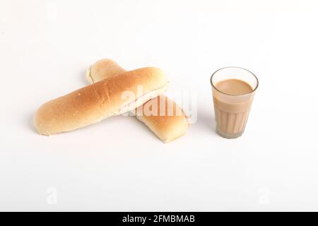 Famous breakfast. Tea and Bun on wooden background Stock Photo