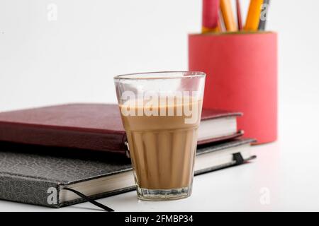 Laptop and Diary with cup of tea. work from home concept Stock Photo