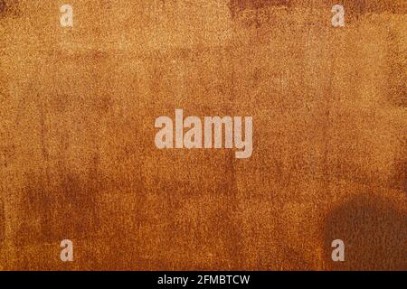 abstract background and texture of white peeling paint surface with orange rust spots. Stock Photo