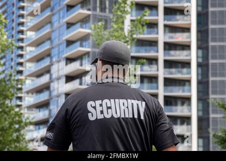 Security guard of condominium watching surveillance Stock Photo - Alamy