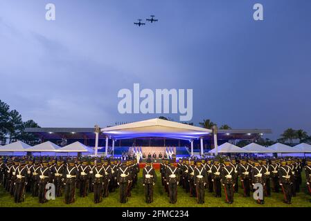 San Salvador, El Salvador. 07th May, 2021. Dragonfly A-37 jets fly over a field with lined up soldiers at a ceremony to commemorate the 197 anniversary of El Salvador's Armed Force. The Salvadoran army is 197 years old and every May 7th it commemorates the 'Day of the Salvadoran soldier.' President Nayib Bukele incorporated 135 cadets to the army during the 197th anniversary celebrations. (Photo by Camilo Freedman/SOPA Images/Sipa USA) Credit: Sipa USA/Alamy Live News Stock Photo