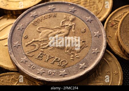 Series of macro shots of euro coins. Reverse of 2 Euro coin. Year of manufacture 2002. Country Greece Stock Photo