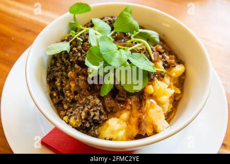 Modern take on haggis, tatties and neeps in Scotland. Stock Photo