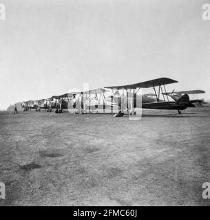 A line up of British RAF, Royal Air Force, Avro Tutor biplane aircraft at The Empire Air Day in Halton, England, in May 1937. Stock Photo