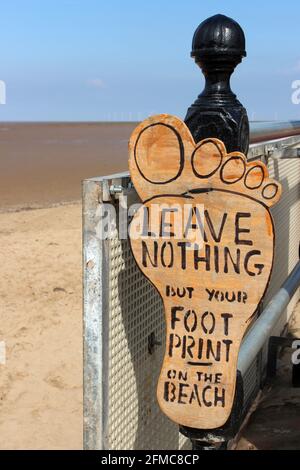 'Leave Nothing But Your Footprint on the Beach' - sign at West Kirkby, Wirral, UK Stock Photo