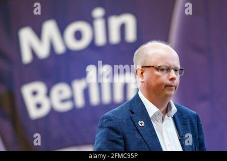 Schleswig, Germany. 08th May, 2021. Stefan Seidler (SSW, 41), candidate for list position 1 of his party, speaks during the extraordinary state party conference for the top candidacy for the Bundestag election at the A. P. Moeller School. Credit: Axel Heimken/dpa/Alamy Live News Stock Photo