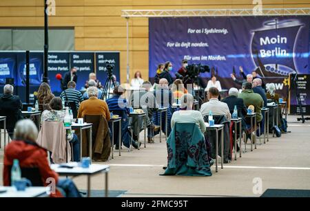 Schleswig, Germany. 08th May, 2021. Deligates of the SSW sit in the A. P. Moeller School during their extraordinary state party conference on the top candidacy for the Bundestag elections. Credit: Axel Heimken/dpa/Alamy Live News Stock Photo