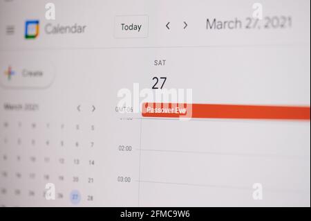 New york, USA - February 17, 2021:Passover Eve 27 of March  on google calendar on laptop screen close up view. Stock Photo