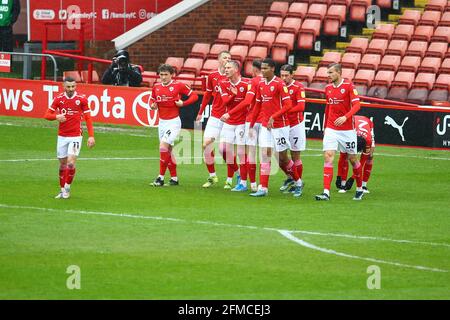 Oakwell, Barnsley, England - 8th May 2021 Cauley Woodrow (9) celebrates with Barnsley players after he scored to make it 1 - 0 during the game Barnsley v Norwich City, Sky Bet EFL Championship 2020/21, at Oakwell, Barnsley, England - 8th May 2021 Credit:  Arthur Haigh/WhiteRosePhotos/Alamy Live News                                        Oakwell, Barnsley, England - 8th May 2021  during the game Barnsley v Norwich City, Sky Bet EFL Championship 2020/21, at Oakwell, Barnsley, England - 8th May 2021 Credit:  Arthur Haigh/WhiteRosePhotos/Alamy Live News Stock Photo