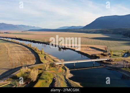 Bridge over the Kootenai River in spring at Copeland. Boundary County, North Idaho. (Photo by Randy Beacham) Stock Photo