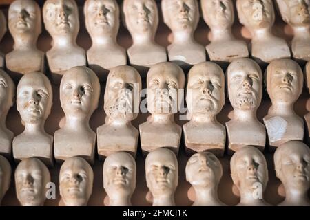 Miniature phrenological heads on display at Science Museum in London Stock Photo
