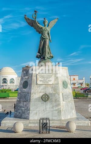 RHODES TOWN, GREECE - OCTOBER 05, 2018: Angel statue of victory in Mandraki harbour. Stock Photo