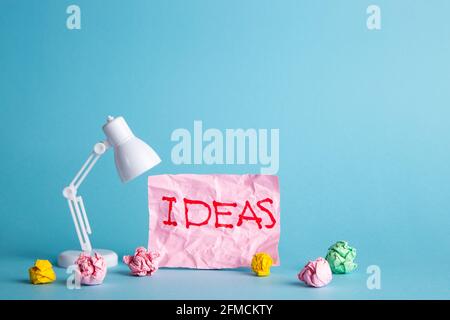 Ideas of creativity concepts with paper crumpled ball and lamp. Business solution Stock Photo