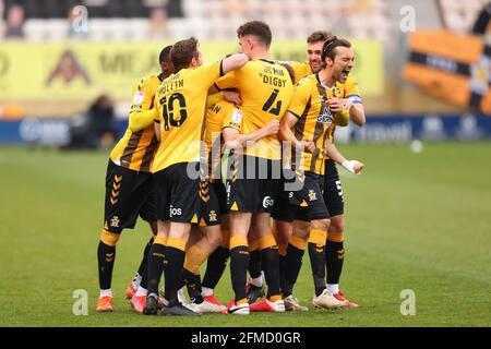 Abbey Stadium, Cambridge, Cambridgeshire, UK. 8th May, 2021. English Football League Two Football, Cambridge United versus Grimsby Town; Wesley Hoolahan celebrates his goal with team mates for 2-0 in the 57th minute Credit: Action Plus Sports/Alamy Live News Stock Photo
