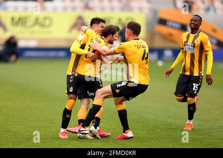 Abbey Stadium, Cambridge, Cambridgeshire, UK. 8th May, 2021. English Football League Two Football, Cambridge United versus Grimsby Town; Wesley Hoolahan celebrates his goal with team mates for 2-0 in the 57th minute Credit: Action Plus Sports/Alamy Live News Stock Photo