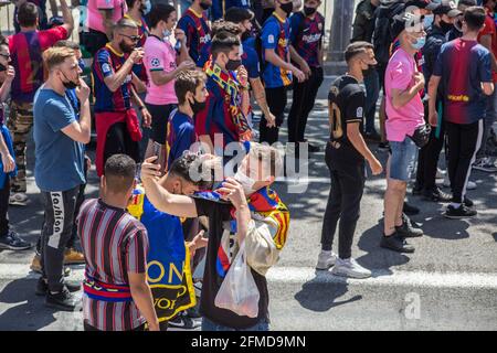 Barcelona, Spain. 08th May, 2021. Football Club Barcelona fan takes a selfie. The ultras supporter group of Football Club Barcelona, Boixos Nois (Crazy Boys) have gathered outside the Camp Nou stadium to motivate the team before the match against Club Atletico de Madrid for the 35th round of La Liga, the Spanish football league. Barça's victory will put the team, currently in third place, ahead of Atletico de Madrid, which occupies the first position. Credit: SOPA Images Limited/Alamy Live News Stock Photo