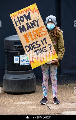 Protest in Docklands, London after a fire in a Ballymore property still clad in flammable cladding years after the Grenfell tower disaster. Stock Photo