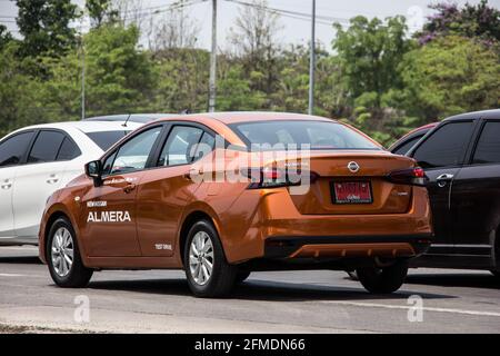 Chiangmai, Thailand - March  21 2021:  Private Eco car, New Nissan Almera. Photo at road no 121 about 8 km from downtown Chiangmai, thailand. Stock Photo