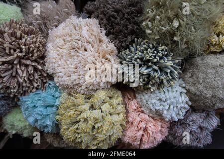 Rheinfelden, Switzerland - November 25, 2020: Detail of a decorative wreath on the front door of the house, made of woolen balls in different colors Stock Photo