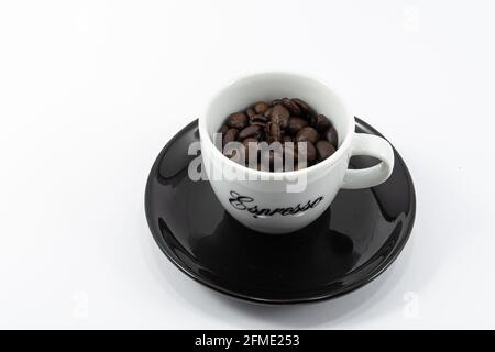 Zurich, Switzerland - June 12, 2020: A cup of espresso coffee filled with beans Stock Photo