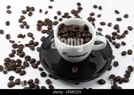 Zurich, Switzerland - June 12, 2020: A cup of espresso coffee filled with beans Stock Photo