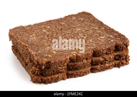 Three slices of German health bread with sunflower seeds isolated on white. Stock Photo