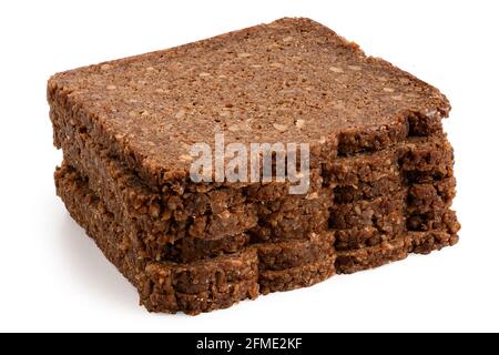 Stack of slices of German health bread with sunflower seeds isolated on white. Stock Photo