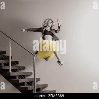 beautiful dancing girl jumping Stock Photo - Alamy