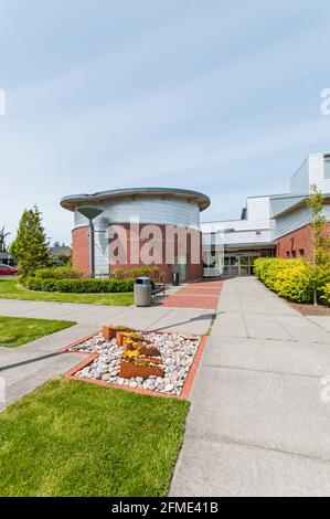 The Anacortes Public Library exterior showing the rotunda in Anacortes, Washington.  Shows unusual funnel-shaped downspout. Stock Photo