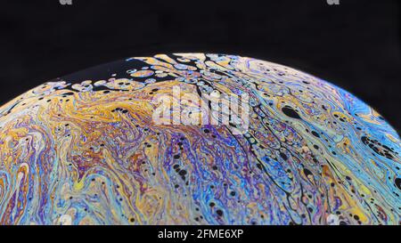 Beautiful psychedelic abstractions on the surface soap bubbles Stock Photo
