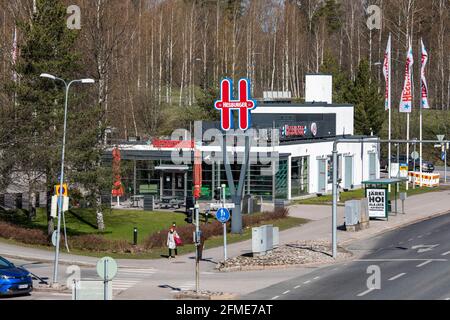 Hesburger drive-thru hamburger restaurant in Munkkiniemi district of Helsinki, Finland Stock Photo