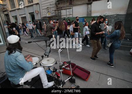 Madrid, Spain, The state of alarm is withdrawn at the first minute of 05-09-2021 in Spain, and with it measures that have been applied for six months, each Autonomous Community adapts its measures to its situation, in Madrid the curfew from 00:00 to 6:00 a.m. Madrid will regain a certain normality, although it will continue to maintain restrictive measures to prevent the spread of infections, given that the pandemic continues, the use of masks is still mandatory, both inside public spaces.From Sunday, the hotel and restaurant establishments will be able to close at midnight. The last client wi Stock Photo