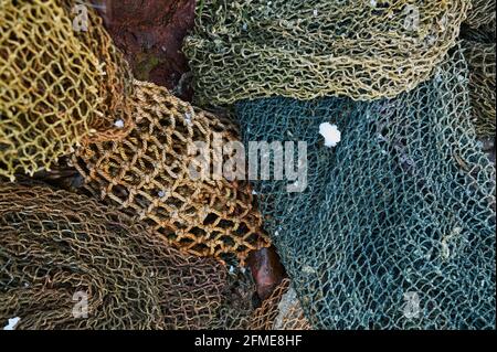 A fishing net is a net used for fishing. Nets are devices made from fibers  woven in a grid-like structure. Some fishing nets are also called fish trap  Stock Photo - Alamy