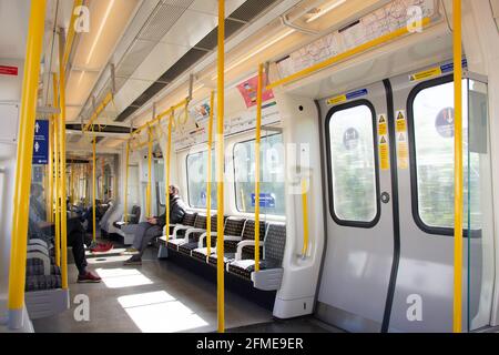 Quiet train carriage interior during pandemic, London Underground, Greater London, England, United Kingdom Stock Photo