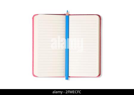 Pink Blank open office Notepad or notebook isolated on white background and blue pencil. Mock up. Top view Stock Photo