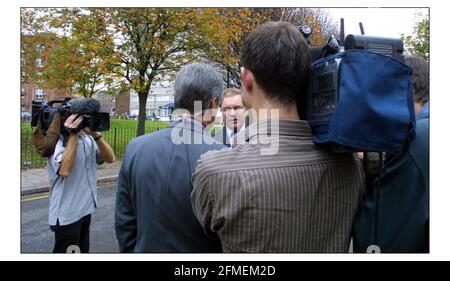 Shadow Housing and Local Government minister Geoffrey Clifton-Brown  attempts to explain the absence of the Tory leader Iain Duncan Smith from a visit to an inner city housing estate near Old Street, London, on Tuesday 5 November 2002.pic David Sandison 5/11/2002 Stock Photo